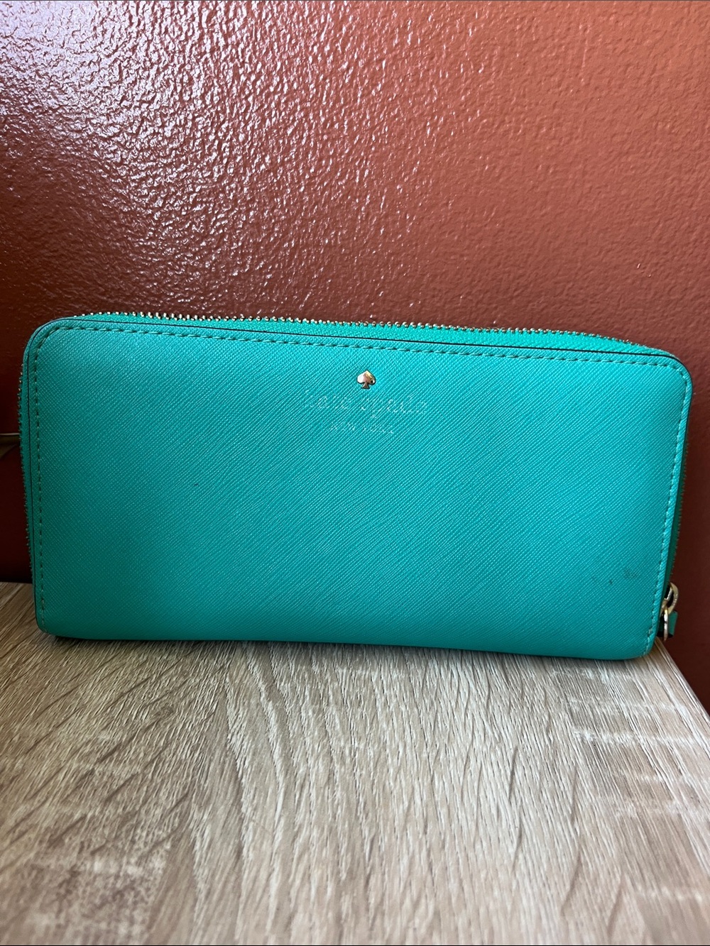 kate spade turquoise saffiano leather wallet with gold accent